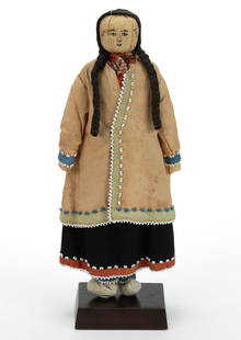 NATIVE AMERICAN SENECA CORNHUSK DOLL WITH BEADED CLOTHING: NATIVE AMERICAN SENECA CORNHUSK DOLL WITH BEADED CLOTHING, made from cornhusk, face having black ink/painted features, hair made of cloth terminating into two braids, wearing hand-sewn clothing