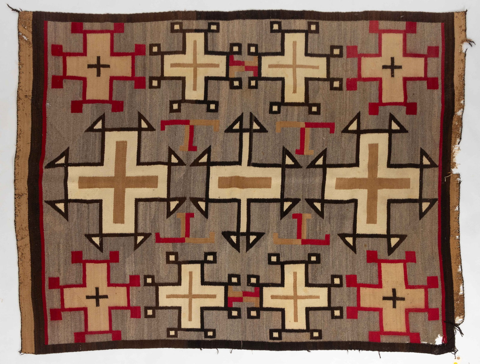 NATIVE AMERICAN NAVAJO WOOL LARGE BLANKET / RUG: NATIVE AMERICAN NAVAJO WOOL LARGE BLANKET / RUG, colors comprising black-brown, red, golden tan, grey-brown, and white, having a geometric designs featuring crossed and "T" motifs, several s