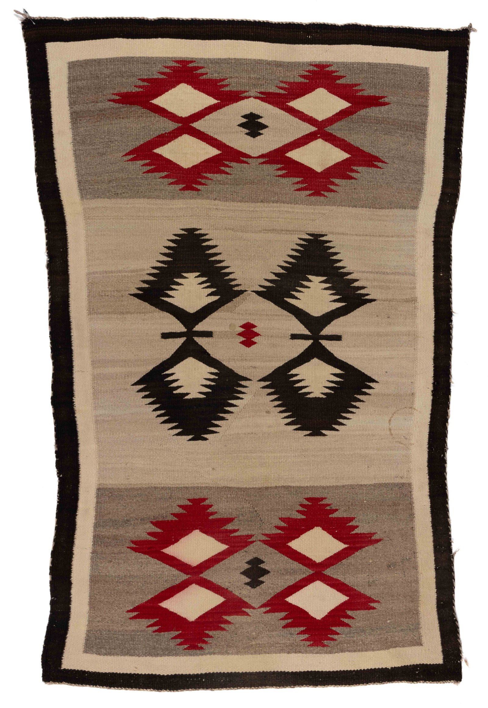 NATIVE AMERICAN NAVAJO WOOL BLANKET / RUG: NATIVE AMERICAN NAVAJO WOOL BLANKET / RUG, colors comprising red, grey, white, and black-brown, having diamond and serrated geometric motif designs, double border to all four sides, several sectioned