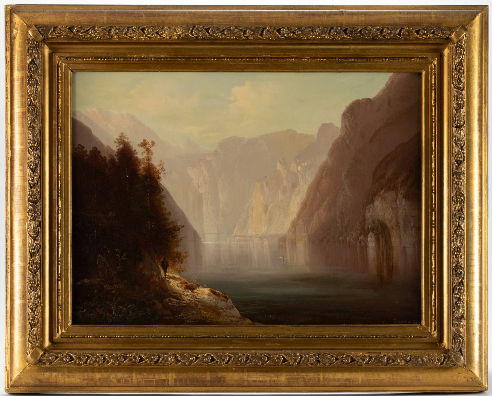 FERDINAND FELDHUTTER (GERMAN, 1842-1898) ALPINE LANDSCAPE WITH FIGURES: FERDINAND FELDHUTTER (GERMAN, 1842-1898) ALPINE LANDSCAPE WITH FIGURES, oil on canvas, featuring a single hiker on a narrow trail perched on a cliff above a pristine mountain lake with fishermen&