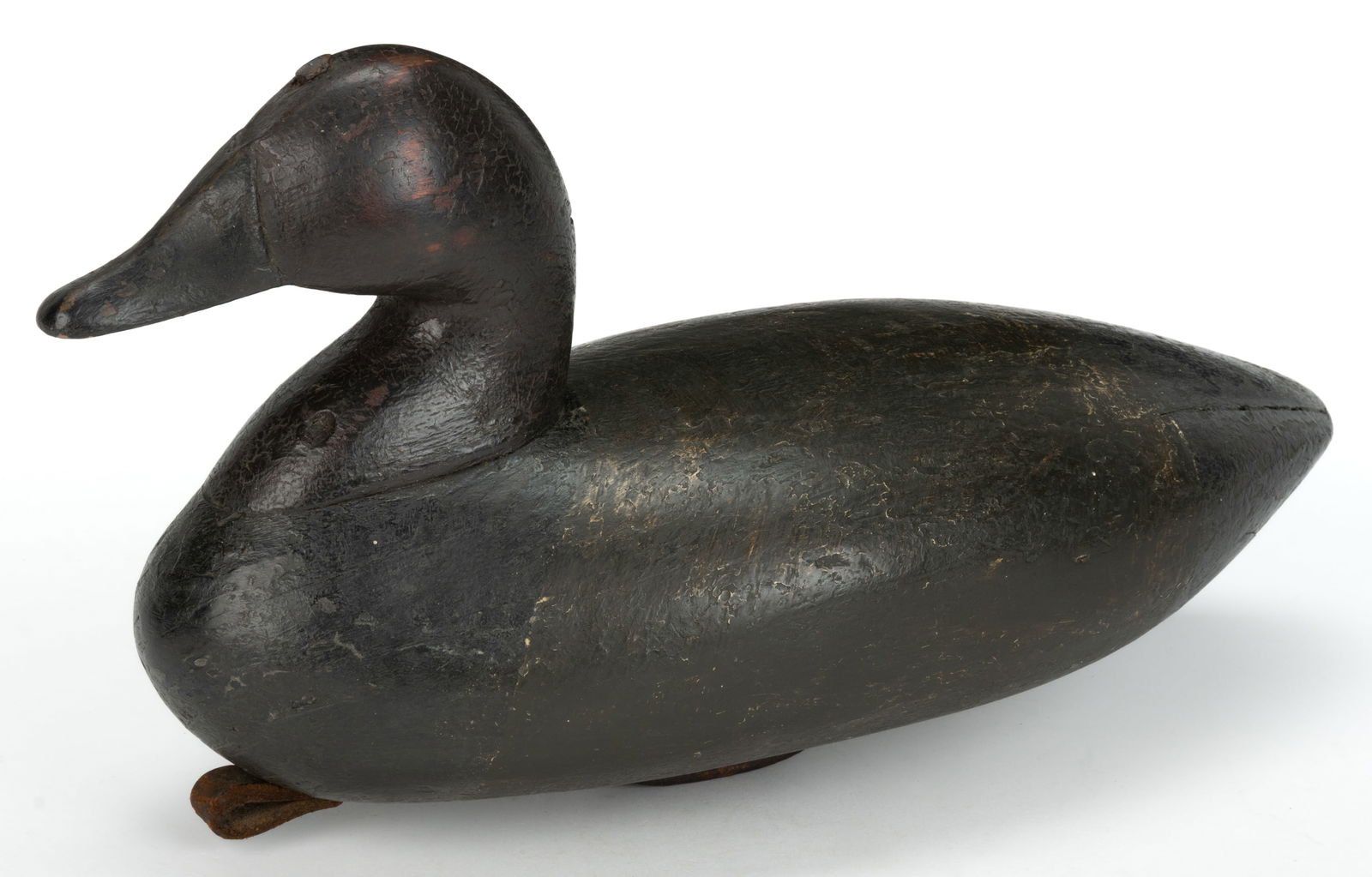 JAMES BEST (KITTY HAWK, NORTH CAROLINA, 1866-1933), ATTRIBUTED, CARVED AND PAINTED CANVASBACK DECOY: JAMES BEST (KITTY HAWK, NORTH CAROLINA, 1866-1933), ATTRIBUTED, CARVED AND PAINTED CANVASBACK DECOY, solid-body form with applied lead weight to underside and old painted surface. First quarter 20th c
