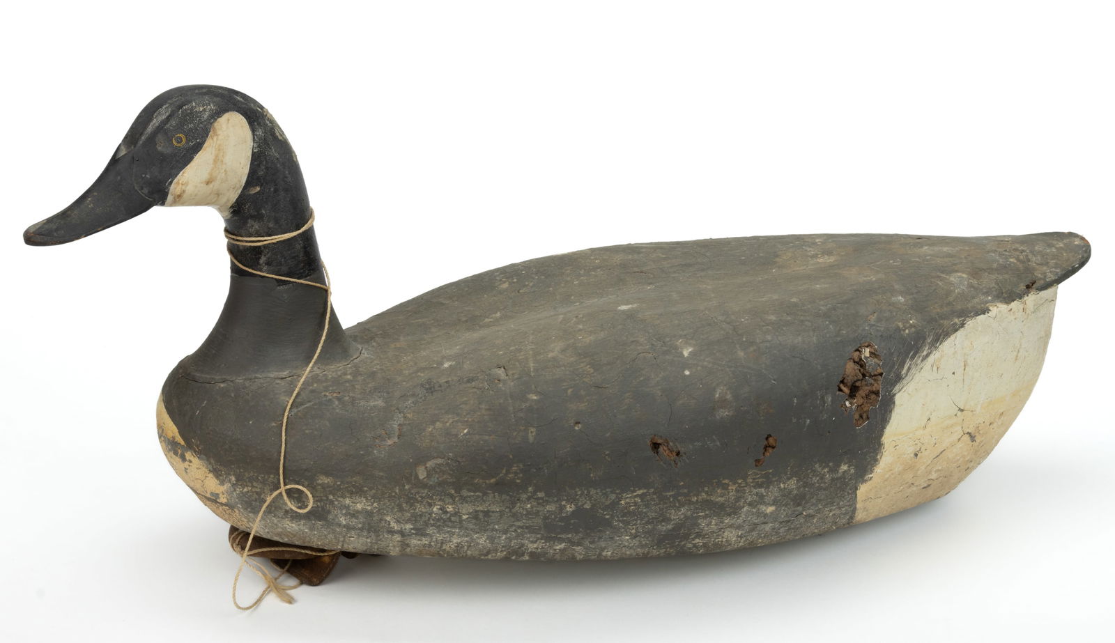 MADISON MITCHELL (HAVRE DE GRACE, MARYLAND, 1901-1993), ATTRIBUTED, CARVED AND PAINTED CANADA GOOSE: MADISON MITCHELL (HAVRE DE GRACE, MARYLAND, 1901-1993), ATTRIBUTED, CARVED AND PAINTED CANADA GOOSE DECOY, with cork body and applied lead weight to underside, retaining old working surface. Mid 20th