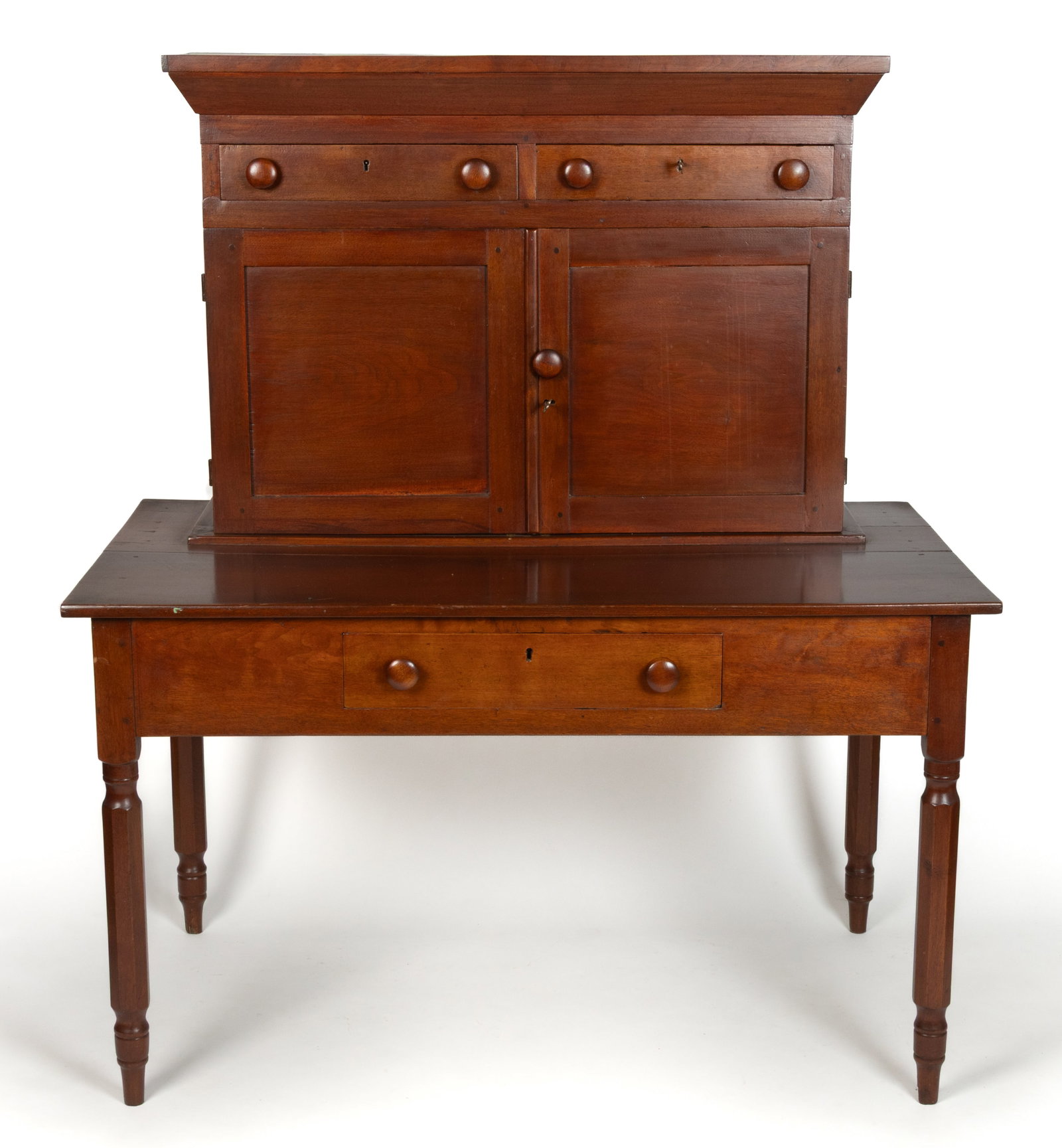 ROCKBRIDGE CO., SHENANDOAH VALLEY OF VIRGINIA, WALNUT COMMANDANT'S DESK: ROCKBRIDGE CO., SHENANDOAH VALLEY OF VIRGINIA, WALNUT COMMANDANT’S DESK, one-piece construction, top with two short drawers with likely original pulls over two fielded-panel doors concealing an 