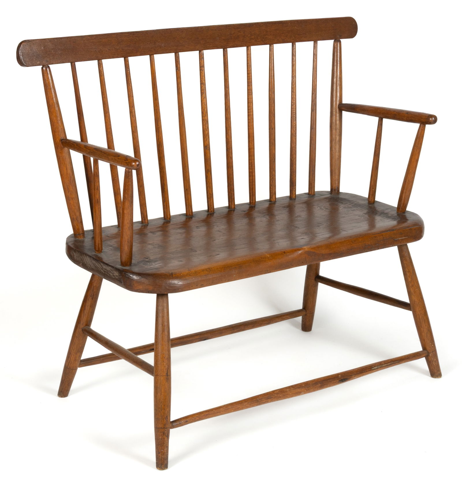 SHENANDOAH VALLEY OF VIRGINIA DIMINUTIVE WINDSOR WHITE OAK AND POPLAR SETTEE: SHENANDOAH VALLEY OF VIRGINIA DIMINUTIVE WINDSOR WHITE OAK AND POPLAR SETTEE, the elongated tablet back over an 11-spindle back, turned arms with spindle supports, and a shaped seat, the whole support