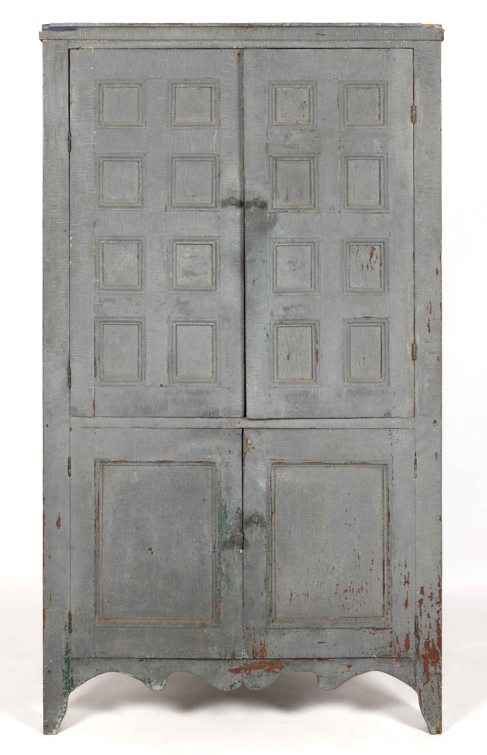 WESTERN VIRGINIA PAINTED WALNUT AND POPLAR CORNER CUPBOARD: WESTERN VIRGINIA PAINTED WALNUT AND POPLAR CORNER CUPBOARD, the applied molded cornice over two hinged cabinet doors, each having eight panels, which conceal two fixed shelves, the lower cabinet doors