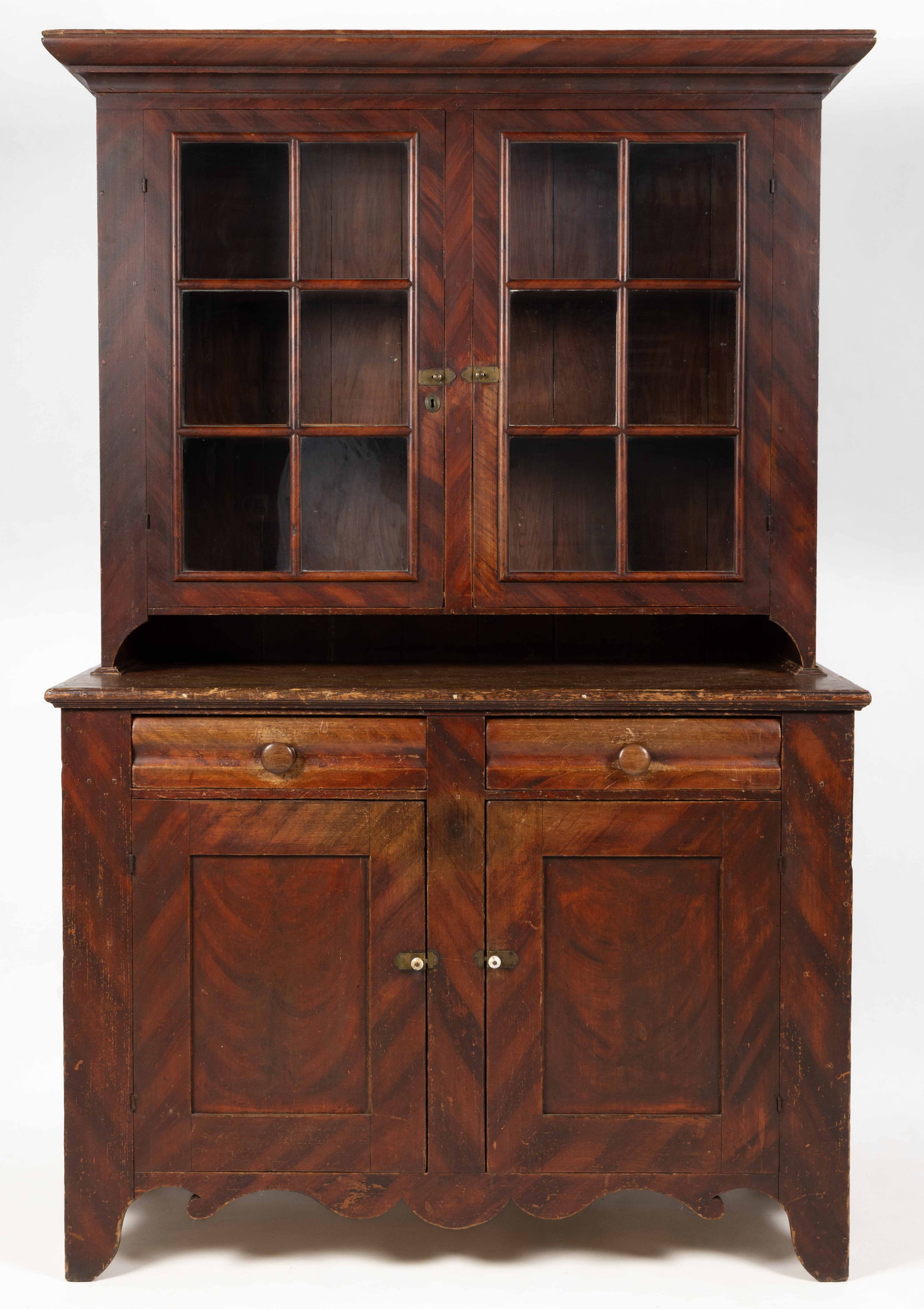PENNSYLVANIA PAINT-DECORATED POPLAR STEPBACK DUTCH CUPBOARD: PENNSYLVANIA PAINT-DECORATED POPLAR STEPBACK DUTCH CUPBOARD, two-piece construction, upper case with applied molded cornice over two six-light doors concealing three fixed shelves above an open pie sh