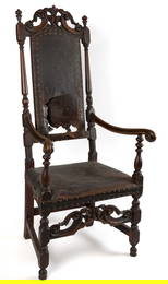 IMPORTANT BOSTON, MASSACHUSETTS WILLIAM & MARY CARVED AND TURNED MAPLE "LEATHER-BACK" ARMCHAIR