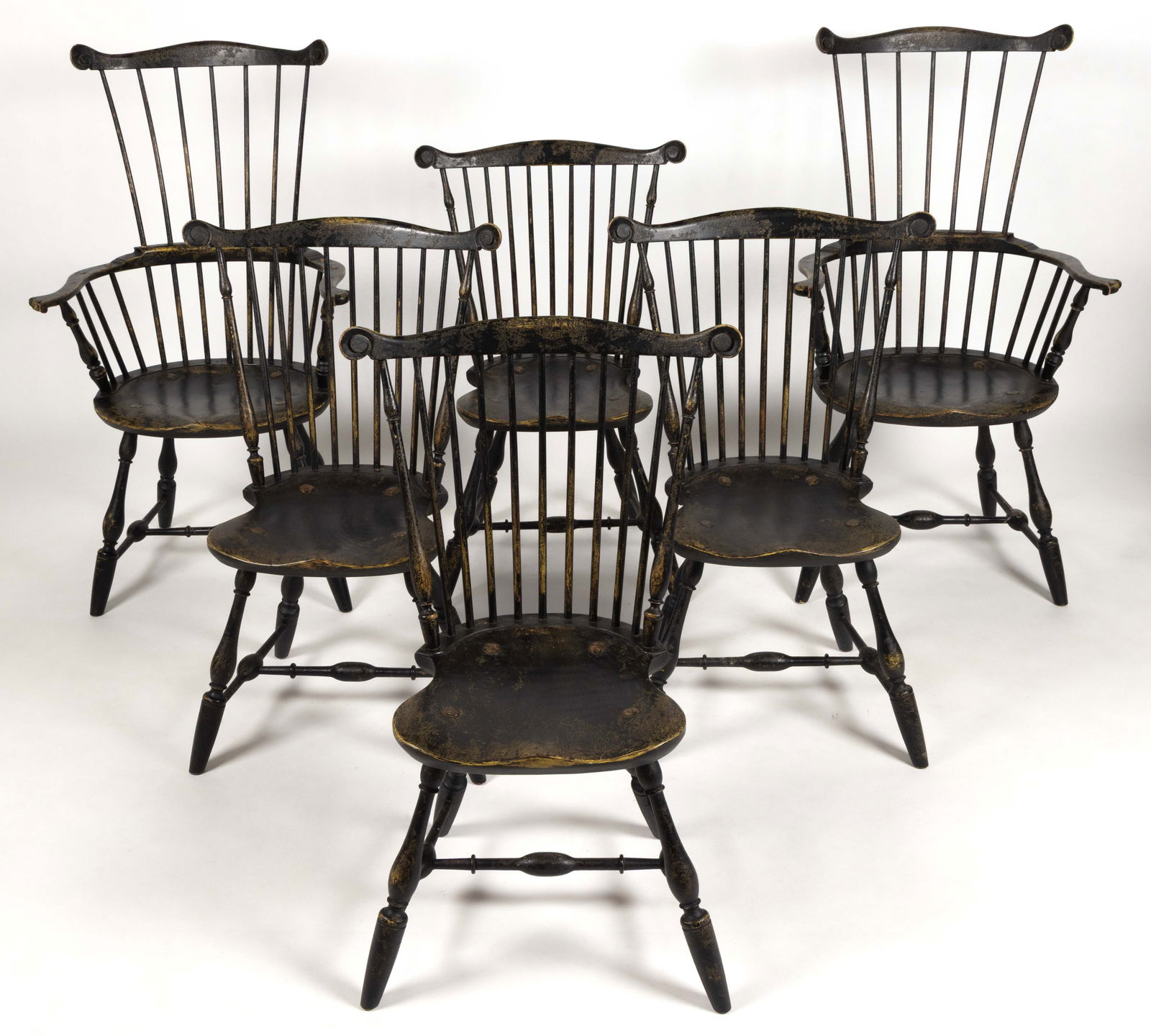 SET OF SIX WILLIAM WALLICK (YORK CO., PENNSYLVANIA, XX-XIX) WINDSOR-STYLE COMB-BACK DINING CHAIRS: SET OF SIX WILLIAM WALLICK (YORK CO., PENNSYLVANIA, XX-XIX) WINDSOR-STYLE COMB-BACK DINING CHAIRS, comprising four side chairs and two arm chairs, each with nine-spindle back, shaped plank seat, turne
