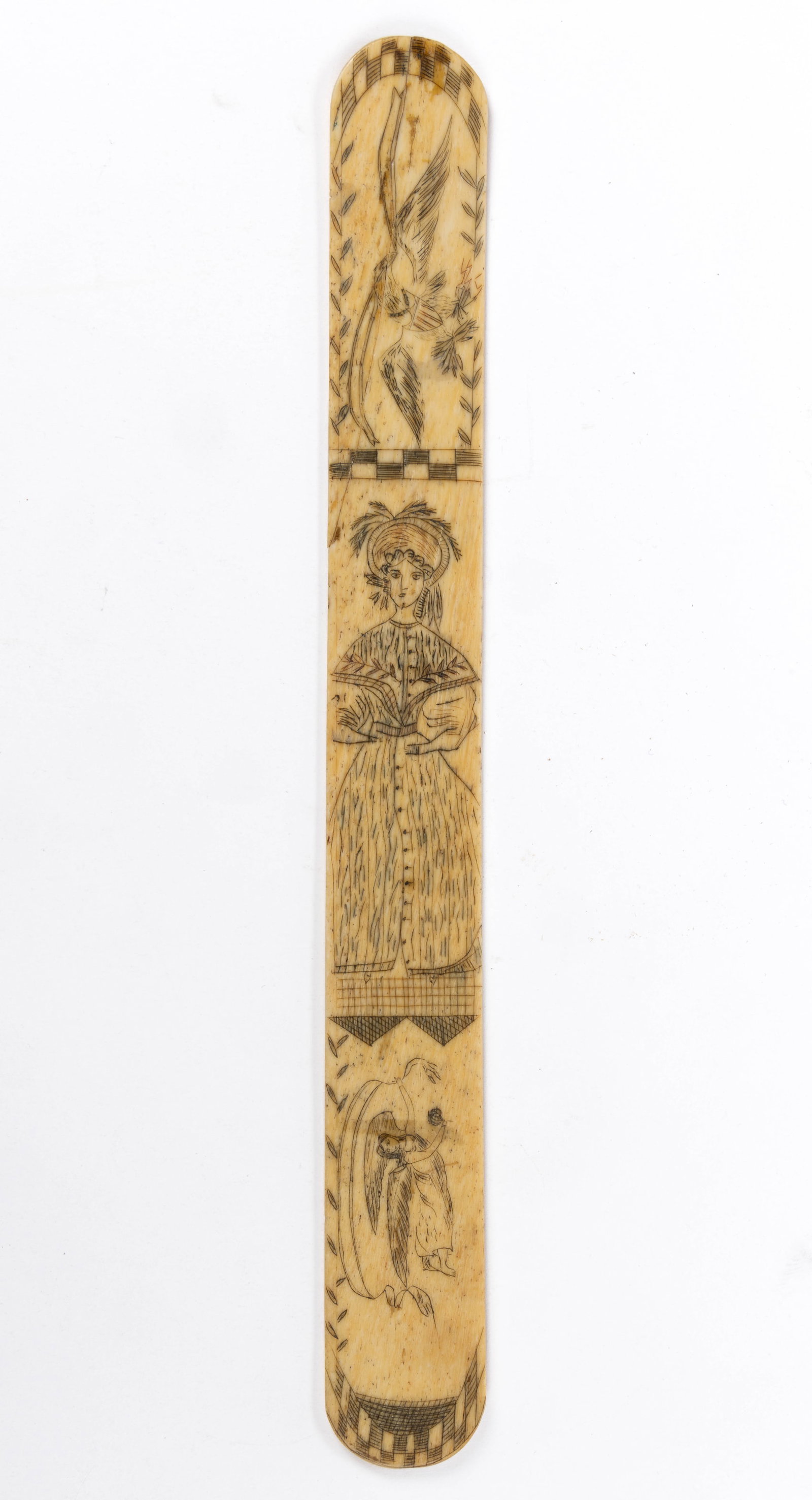 AMERICAN, PROBABLY MASSACHUSETTS SCRIMSHAW WHALEBONE CORSET BUSK / STAY: AMERICAN, PROBABLY MASSACHUSETTS SCRIMSHAW WHALEBONE CORSET BUSK / STAY, composed of three vignettes, featuring a spread-wing shield-breast eagle holding a banner in his mouth, a well-d