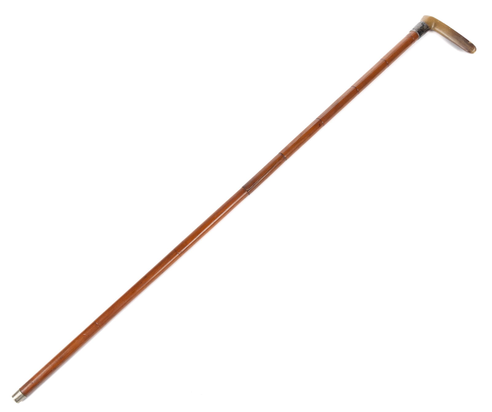 AMERICAN OR ENGLISH TRAVELING / FOLDING CANE: AMERICAN OR ENGLISH TRAVELING / FOLDING CANE, the horn handle above a marked sterling monogrammed ferrule and turned maple shaft which unscrews at the center revealing a small chain which allows