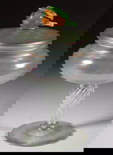 STEUBEN VERRE DE SOIE WITH FIGURAL PEAR IRIDESCENT ART GLASS COVERED VASE: STEUBEN VERRE DE SOIE WITH FIGURAL PEAR IRIDESCENT ART GLASS COVERED VASE, shape 5128, applied mottled orange figural pear finial/handle with applied green stem and leaf, twisted stem, no signature lo