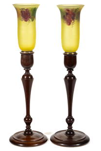 PAIR OF PAIRPOINT "AMBERO" REVERSE-PAINTED ART GLASS HURRICANE SHADE CANDLE LAMPS: PAIR OF PAIRPOINT "AMBERO" REVERSE-PAINTED ART GLASS HURRICANE SHADE CANDLE LAMPS, the colorless glass shades with reverse-painted interior featuring polychrome-enamel Grapes decoration on a yellow gr