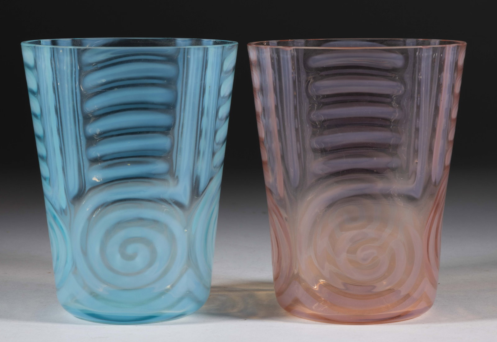 CZECHOSLOVAKIAN GLASS VASES, LOT OF TWO: CZECHOSLOVAKIAN GLASS VASES, LOT OF TWO, comprising a pink and blue tapered transparent opal question mark maze. Maker unverified. 20th century. 5 1/2" H. Provenance: Property of a Richmond, VA privat