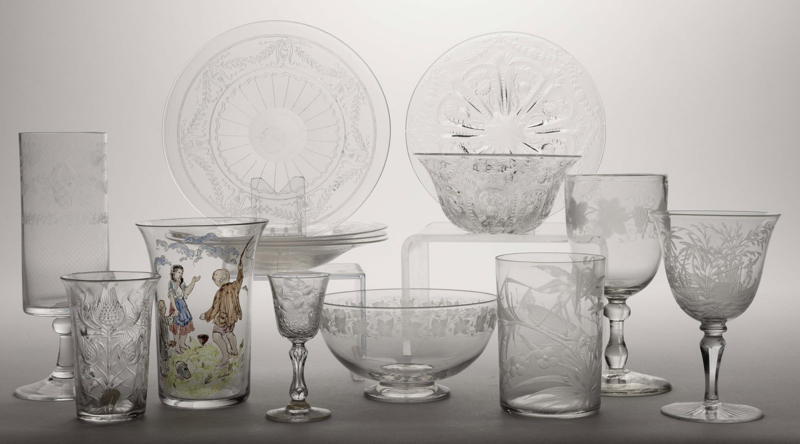 ASSORTED CUT / ETCHED GLASS ARTICLES, LOT OF 14: ASSORTED CUT / ETCHED GLASS ARTICLES, LOT OF 14, mostly colorless, including a Rosenthal "Idyll" wine glass, a cordial with foliate decoration, and a Tiffin attributed wine glass with etched grape vin