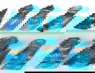 VICTORIAN CUT / POLISHED INKWELLS, LOT OF SEVEN: VICTORIAN CUT / POLISHED INKWELLS, LOT OF SEVEN, electric and sapphire blue, comprising octagonal, square, pyramidal, rectangular with pen rests, and lozenge-shaped examples, each with a hinged lid. F