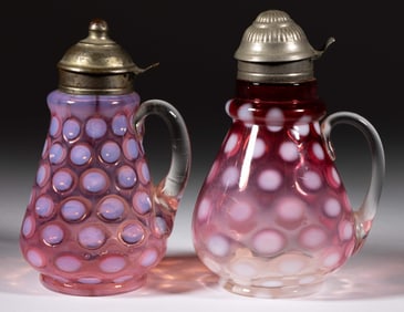 COINSPOT OPALESCENT GLASS SYRUP PITCHERS, LOT OF TWO
