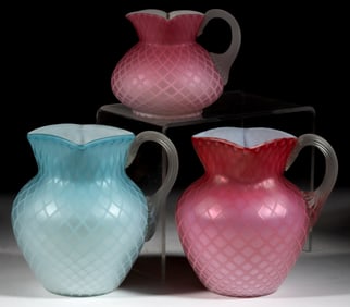 PHOENIX DIAMOND-QUILT AIR-TRAP MOTHER-OF-PEARL SATIN ART GLASS PITCHERS, LOT OF THREE