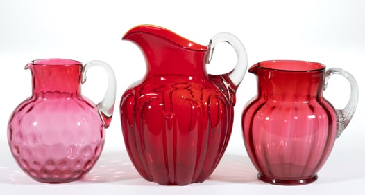 VICTORIAN ART GLASS PITCHERS, LOT OF THREE