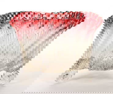 NORTHWOOD ATTRIBUTED SHELLS AND RIBS TRIANGULAR GLASS BOWL: NORTHWOOD ATTRIBUTED SHELLS AND RIBS TRIANGULAR GLASS BOWL, rubina, triangular form with ruffled rim, raised on three applied shell feet, pressed six-petaled floral prunt applied under base to hide th