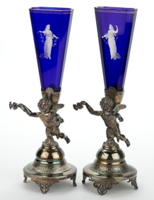 VICTORIAN ENAMEL-DECORATED ART GLASS VASES IN FIGURAL QUADRUPLE PLATE STANDS, LOT OF TWO
