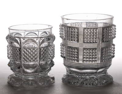 FRENCH PRESSED / PRESSURE-MOLDED GLASS TUMBLERS, LOT OF TWO: FRENCH PRESSED / PRESSURE-MOLDED GLASS TUMBLERS, LOT OF TWO, heavy colorless glass, each of waisted/footed cylindrical form, comprising one example with a paneled sharp diamond band at midsection betw
