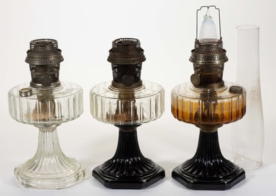 ALADDIN MODELS B-100 AND B-104 / CORINTHIAN KEROSENE STAND LAMPS, LOT OF THREE