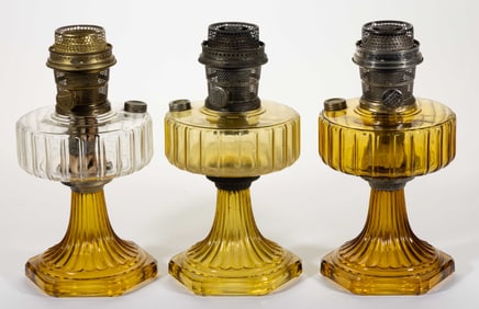 ALADDIN MODELS B-101 AND B-106 / CORINTHIAN KEROSENE STAND LAMPS, LOT OF THREE
