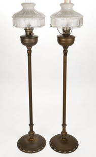 ALADDIN MODEL B-425 KEROSENE FLOOR LAMPS, LOT OF TWO: ALADDIN MODEL B-425 KEROSENE FLOOR LAMPS, LOT OF TWO, Bronze finish, a pair of domed font bowls each raised on Classical top connector, central ribbed pole leading to a complex looped and paneled lowe