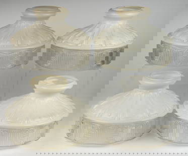 ALADDIN MODEL NO. 501 TABLE LAMP SHADES, LOT OF FOUR: ALADDIN MODEL NO. 501-9 TABLE LAMP SHADES, LOT OF FOUR, colorless with white enamel panels over colorless scalloped and prismatic apron. The Mantle Lamp Company of America (Aladdin). Second quarter 20