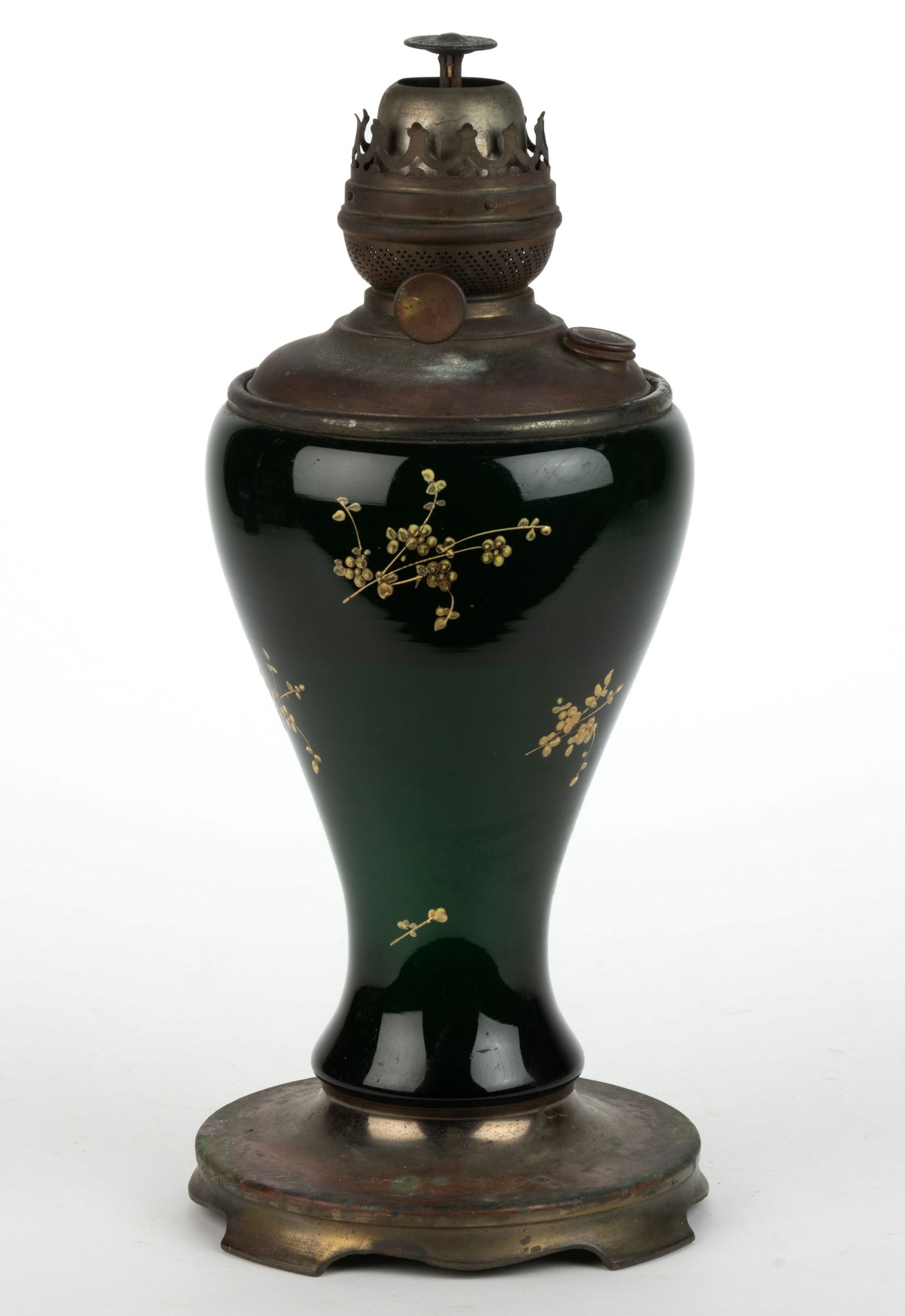 PITTSBURGH LAMP BRASS & GLASS CO VASE PARLOR LAMP BASE: PITTSBURGH LAMP BRASS & GLASS CO VASE PARLOR LAMP BASE, cased deep emerald green glass with white and gilded enamel floral decoration vase holder, brass drop-in font with side-refill feature. Fitted w