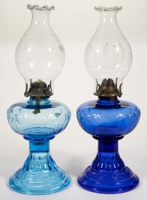 PANEL AND FLORAL EMBOSSED KEROSENE MASSIVE SEWING / STAND LAMPS, LOT OF TWO