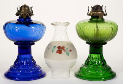 PANEL AND FLORAL EMBOSSED KEROSENE MASSIVE SEWING / STAND LAMPS, LOT OF TWO