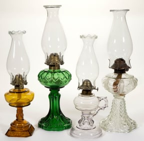 ASSORTED PATTERNED KEROSENE LAMPS, LOT OF FOUR
