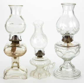ASSORTED PATTERNED KEROSENE LAMPS, LOT OF THREE