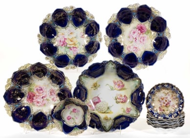 R.S. PRUSSIA PORCELAIN COBALT-DECORATED FLORAL MOTIF BOWLS, LOT OF 11
