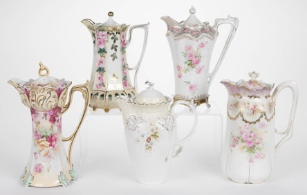 R.S. PRUSSIA PORCELAIN FLORAL MOTIF CHOCOLATE POTS, LOT OF FIVE