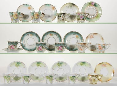 R.S. PRUSSIA PORCELAIN FLORAL MOTIF DEMITASSE CUPS AND SAUCERS, LOT OF 28