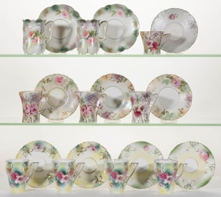 R.S. PRUSSIA PORCELAIN FLORAL MOTIF CUP AND SAUCER SETS, LOT OF TEN