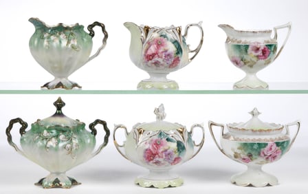 R.S. PRUSSIA PORCELAIN FLORAL MOTIF TEA ARTICLES, LOT OF SIX