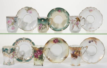 R.S. PRUSSIA PORCELAIN FLORAL MOTIF CHOCOLATE CUP AND SAUCER SETS, LOT OF SIX