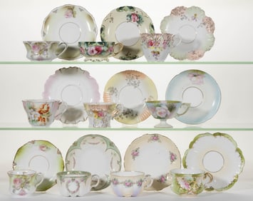 R.S. PRUSSIA AND OTHER SIMILAR PORCELAIN FLORAL MOTIF CUP AND SAUCER SETS, LOT OF TEN