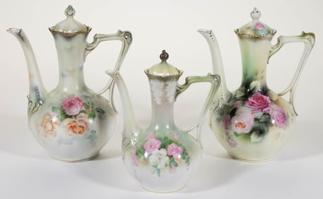 R.S. PRUSSIA PORCELAIN FLORAL MOTIF DEMITASSE POTS, LOT OF THREE