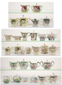 R.S. PRUSSIA PORCELAIN FLORAL MOTIF CREAMER AND SUGAR BOWL SETS, LOT OF 14