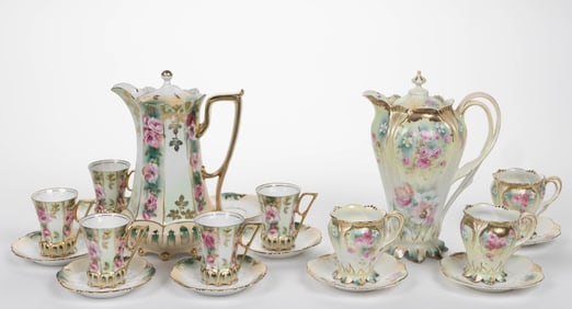 R.S. PRUSSIA PORCELAIN FLORAL MOTIF TWO PARTIAL CHOCOLATE SETS, LOT OF 19 PIECES