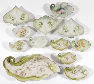 R.S. PRUSSIA PORCELAIN FLORAL MOTIF TABLE ARTICLES, LOT OF 12