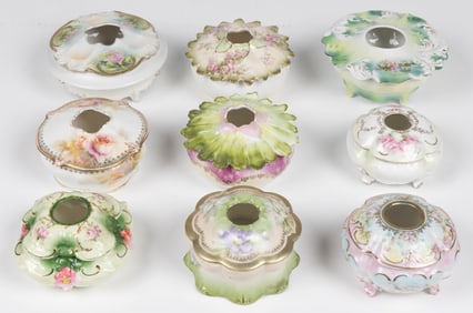 R.S. PRUSSIA / GERMANY PORCELAIN FLORAL MOTIF HAIR RECEIVERS, LOT OF NINE