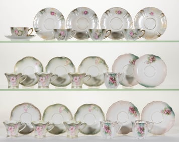 R.S. PRUSSIA PORCELAIN FLORAL MOTIF CUPS AND SAUCERS, LOT OF 28