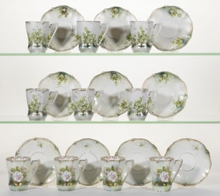 R.S. PRUSSIA PORCELAIN FLORAL MOTIF CHOCOLATE CUP SETS, LOT OF TEN