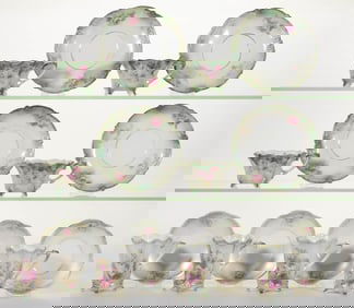 R.S. PRUSSIA-STYLE / ROYAL VIENNA PORCELAIN FLORAL MOTIF CUP AND SAUCER SETS, LOT OF EIGHT