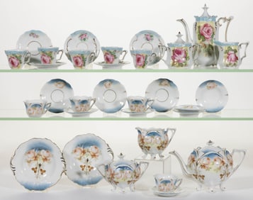R.S. PRUSSIA PORCELAIN FLORAL MOTIF CHILDREN'S TWO PARTIAL TOY TEA SETS, LOT OF 31 PIECES